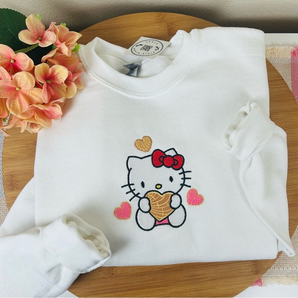 WOMEN’S HELLO KITTY EMBROIDERY SWEATER (UNISEX) - Picture 1 of 10